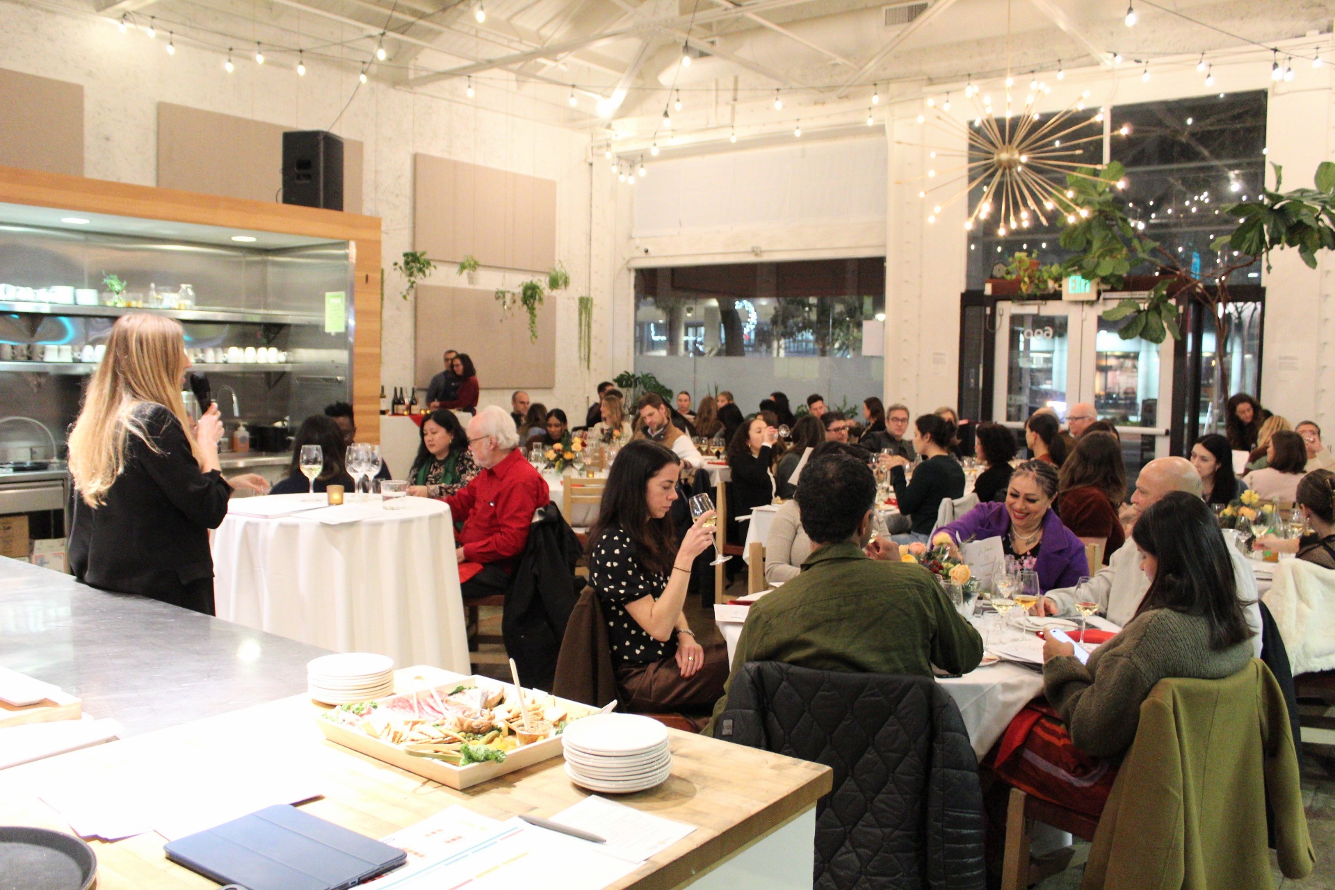 Crowd wine tasting at a Sommplicity event