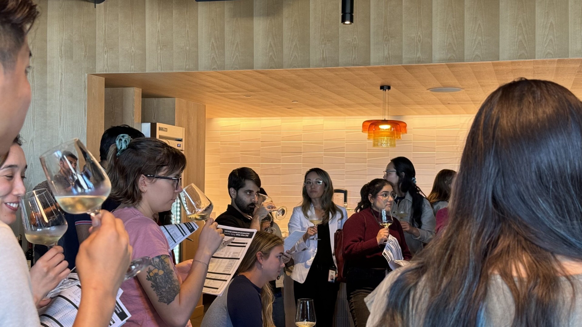 Group of guests tasting wine together